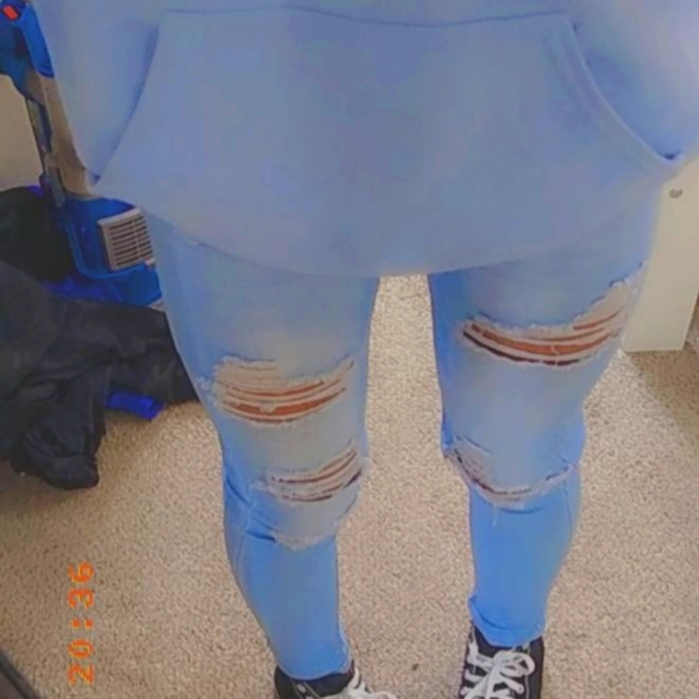 These nice cute light blue jeans ripped pants